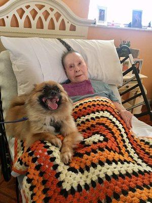 Resident posing with Chewy.