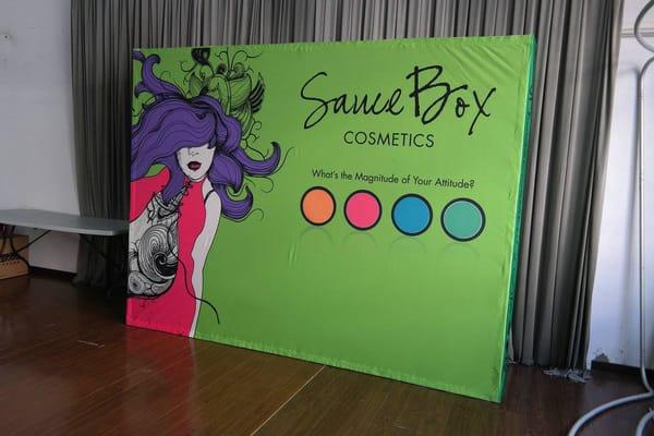 RedKiwi Studios designed our booth backdrop/step and repeat