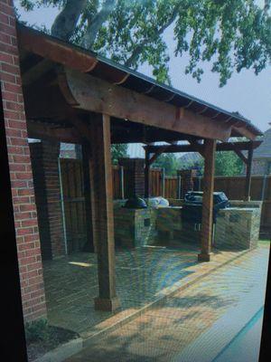 Pool deck, Arbor, and outdoor kitchen.