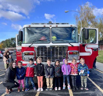 Pre-K enjoying their annual fire fighter on-site field trip