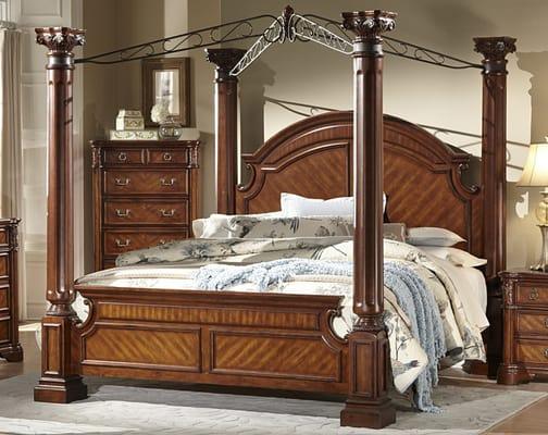 Large poster canopy bed.