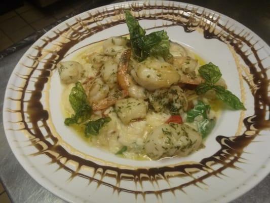 Scallops and shrimp sauteed with garlic shallot & Chablis butter over risotto SPECIAL