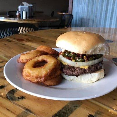 Our famous 56 Burger with a side of onion rings!