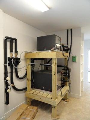 Two geothermal heat pumps stacked