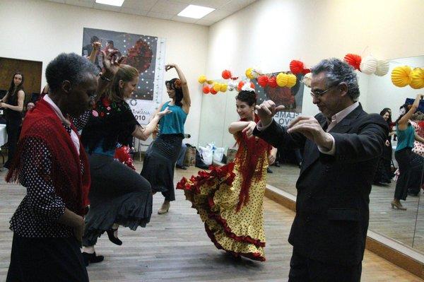 Artistic Director Alice Blumenfeld leading a dance class.