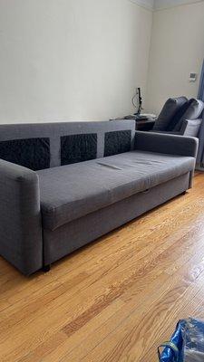 Sofa with lint before cleaning services