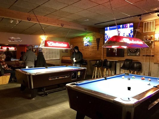 Two pool tables in the bar