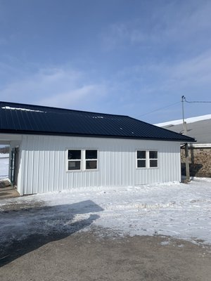 A building we installed steel siding and a metal roof