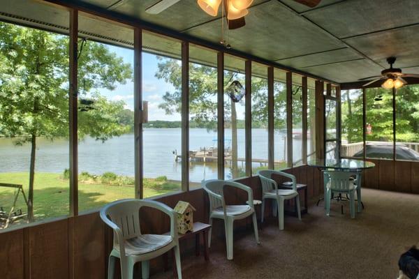 What a deal on Lake Oconee! This view, plus a 2400sf 4BR/3BA home with large master suite! Just $325,000