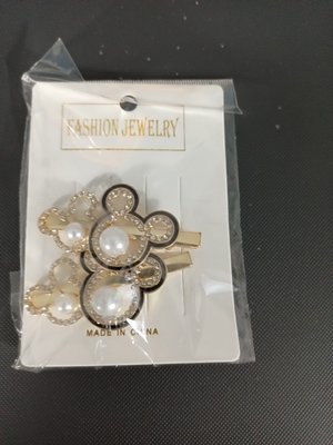 Set of gold Mickey hair barrettes 2.50