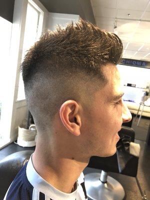 High skin fade fohawk for this gentleman