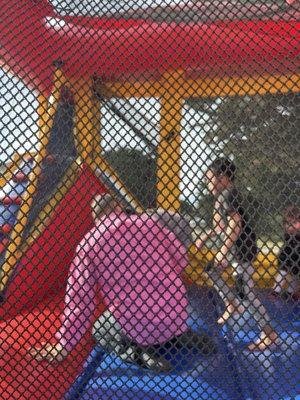 Unfortunately the only picture I got of the jumper with the basketball hoop and slide. It is big and colorful!