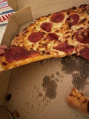 "Hand tossed" pepperoni with "extra sauce". Where's the sauce? Where's the hand-tossed crust? More like thin crust.