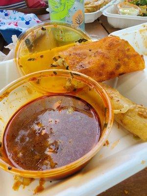 Birria tacos with consomé.