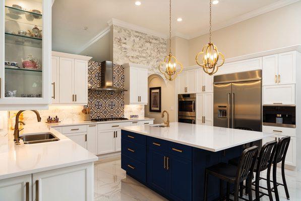 Kitchen countertops, cabinets, island and flooring installed by Kitchen Art in Laguna Hills