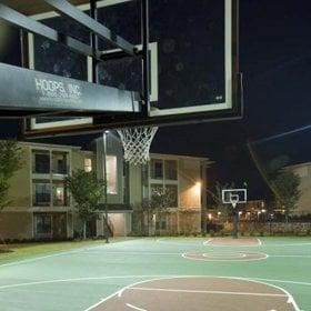 Fairfield Construction installed two Pro Dunk Diamond basketball hoops on this apartment complex's basketball court