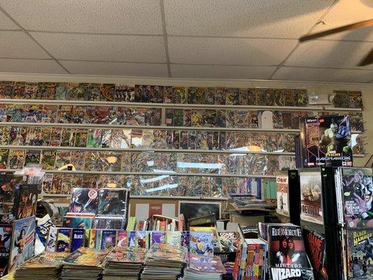 The walls are covered with comics