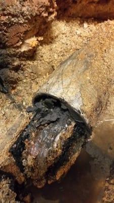 We found this existing sewer line was rotten and full of grease.