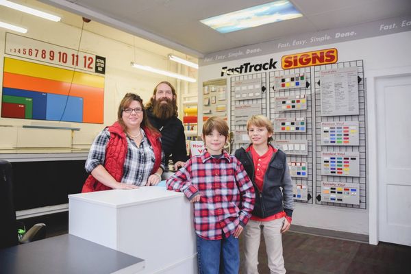 Family legacy in the making! Inside our sign shop, we blend passion and expertise to craft quality signage.