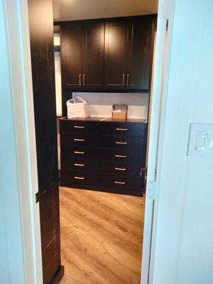 Dark walk-in closet