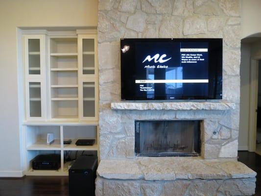 65" TV was installed along with 5.1 Pioneer receiver, cable dvr, bluray player and Wii console.