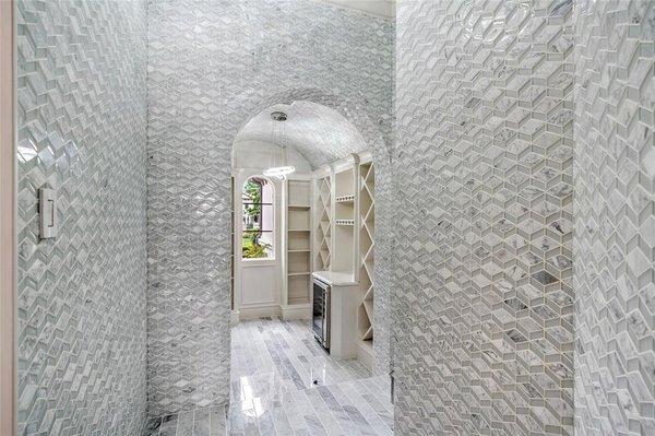 Wall to Wall tile in this Wine Bar