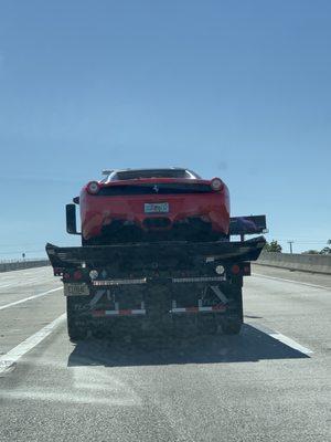 #IGRH32 Ferrari on #E1684E flatbed truck.