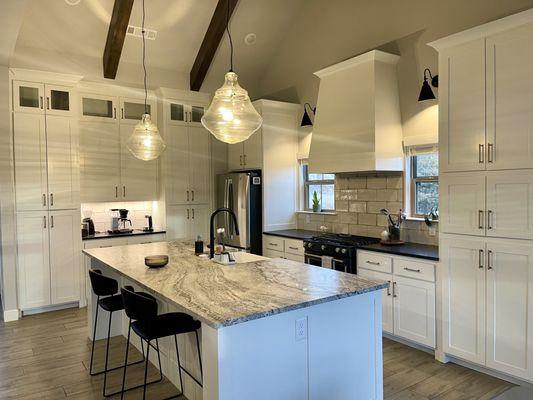 These cabinets used to be blue and Lasun's Painting fulfilled my dreams of a white kitchen!