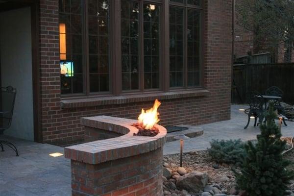 Fire pit, stone patio and landscape lights