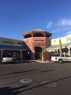 Located in middle of strip mall