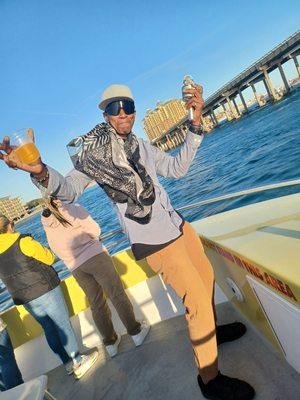 Cheffy Jhea giving riders of the sunset dolphin cruise in FL a show