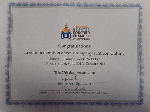 Bibbon cutting Certification of the office of Ernest L. Tomkiewicz CPA PLLC. Provided by the Concord Area Chamber of Commerce