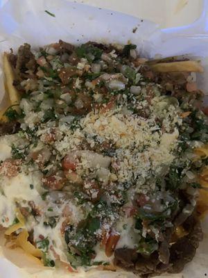 Carne asada fries with enchilada sauce