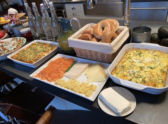 pictured here is one of the breakfast buffets he provided. smoked salmon, fritatta, cheeses, fresh squeezed juices, bagels and Israeli salad