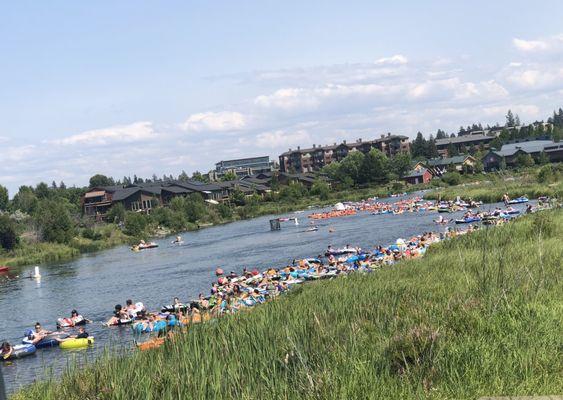 Long busy line of floaters waiting to walk out or go down the small rapids. Midways point for the route!!