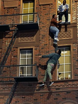 Just hanging around on the side of a building.