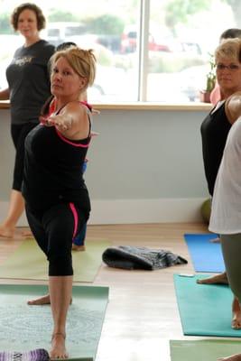 Strong, peaceful warriors at Supreme Peace Yoga and Wellness in South Louisville.