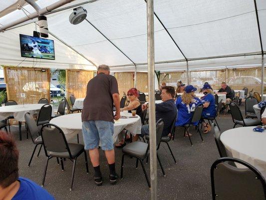 Weekly Friday night dinner under a tent.