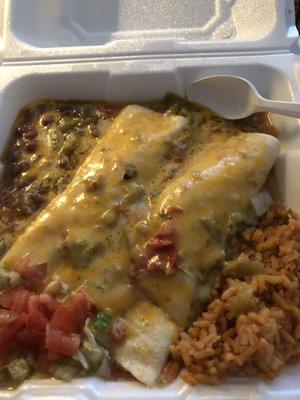 Beef and bean burrito plate smothered in green chili. YUM