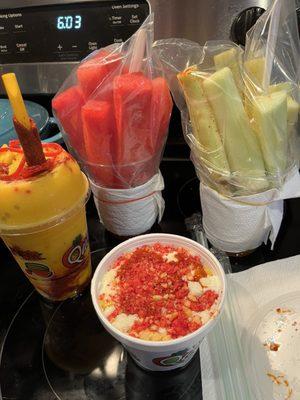 Mangonada, Cucumber w/lime & Tajin, Watermelon, Elote w/cheetos