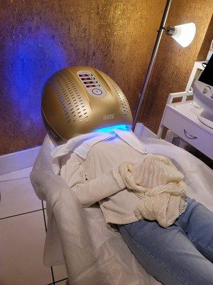 Client getting Dermalux light treatment