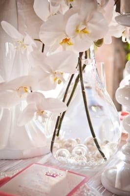 Big Pearls in each container topped with Phalaenopsis white orchids