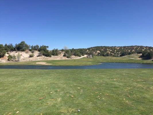 10th hole - recommend long iron off the tee leaving a short wedge shot into a well protected green surrounded by water