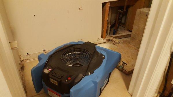 An Air mover, equipment placed for drying the Water Damage of the area