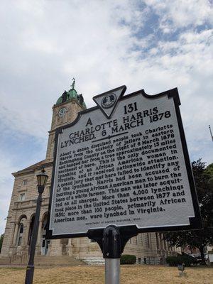 The historical marker with the Rockingham County Courthouse