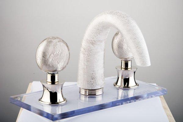 White and silver glass faucet