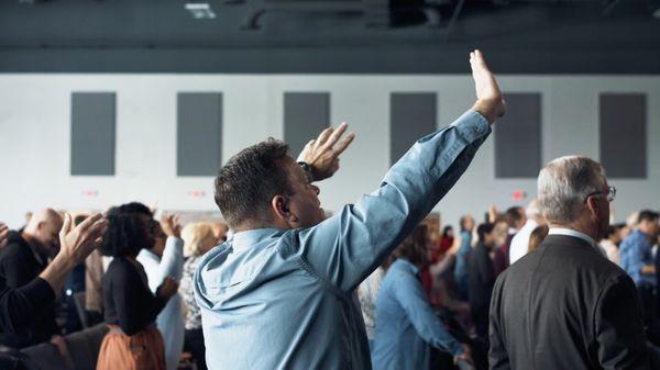 Charis Christian Center church during worship service in main auditorium.