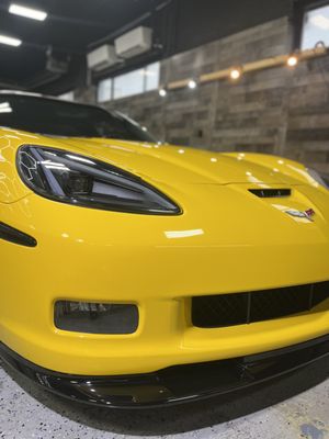 Road Ready! Corvette with gloss black roof wrap, paint correction & topped off with a ceramic coating!