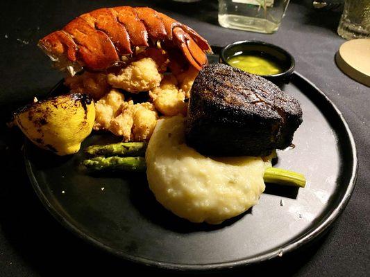 9oz Coffee crusted filet mignon with fried lobster tail, rosemary mashed potatoes, and asparagus.