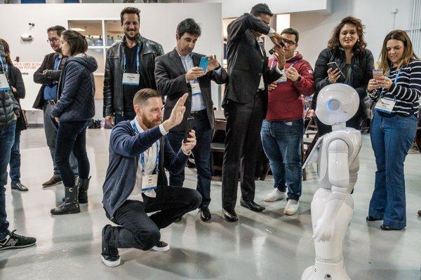 SU program participants meet Pepper the robot.